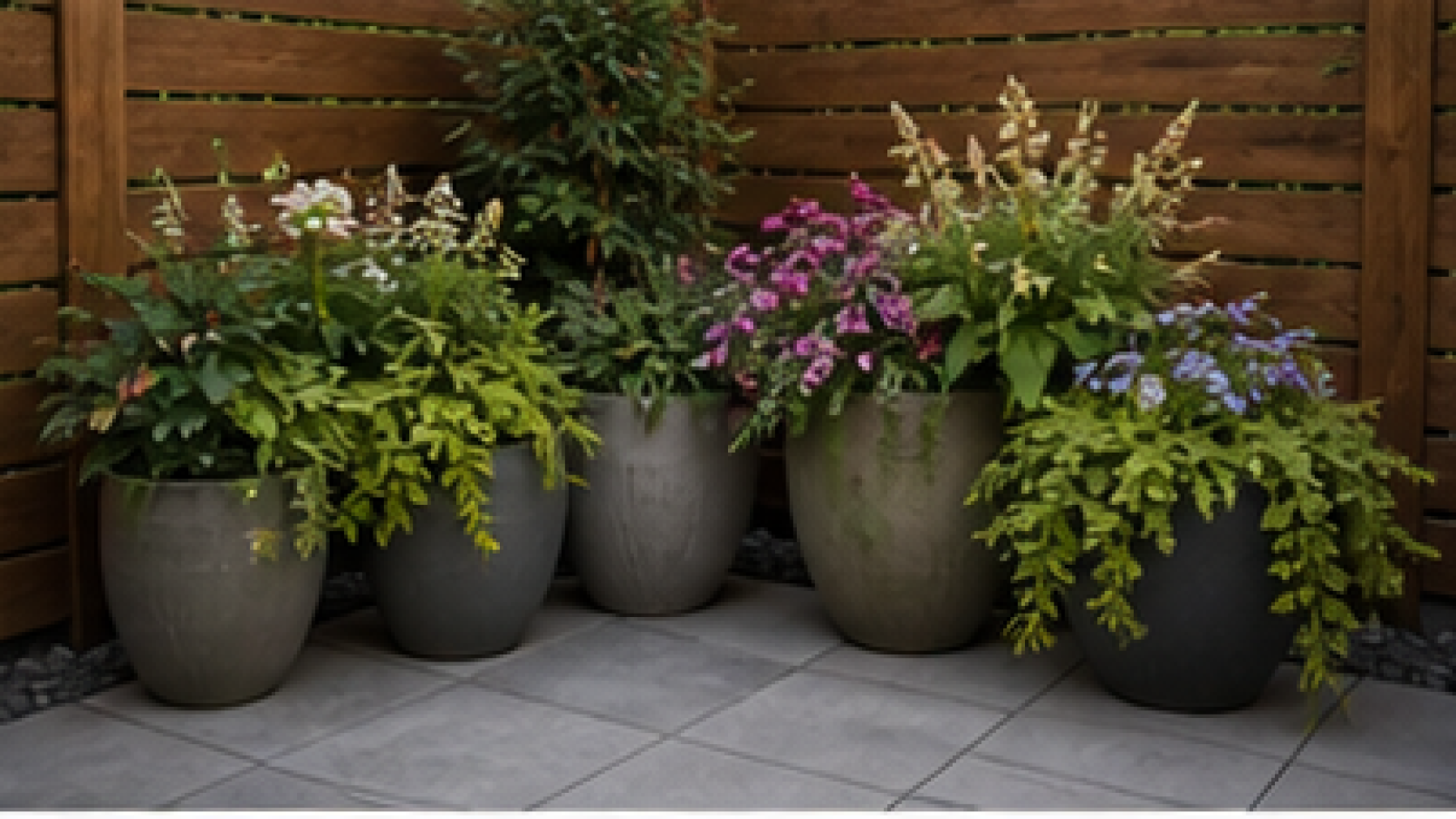 Backyard Corner Landscaping Ideas with planters